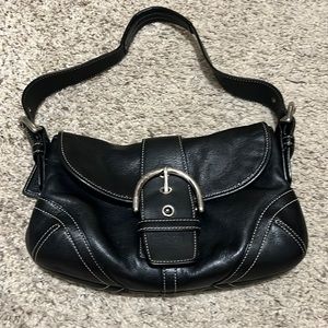 Used small Coach leather handbag with dust bag